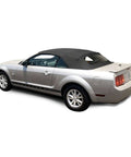Ford Mustang Convertible Top Replacement For 2005 To 2014 With Sailcloth Vinyl Soft Top Heated Glass Window Black OEM Upgrade And DOT Approved Glass Window Your Ride Ready installed on a silver Mustang
