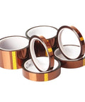 Rolls of Pro Grade High Temperature Polyimide Kapton Tape for electronics and welding in various widths, heat resistant BGA insulation.