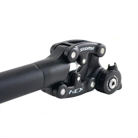 SP12 NCX Suspension Seat Post With Protective Cover 31.6x400mm Black VK2353 for Mountain and Trail Bikes close-up
