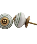 100 Pack Stripe Ceramic White Drawer Knobs Solid Core Build. White ceramic knobs with gold accents and green stripes.