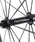 Close-up of Superteam hub on 700C Carbon Wheelset Aero Beast Front 60mm Rear 88mm Clincher For Road Bikes V Brake Shimano