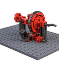 Hands On Mechanics Building Kit With 243 Components For Real World Engineering Fun Expandable With Everyday Objects Kid Friendly STEM Toy For Creative Projects And Problem Solving, red gear model on gray base