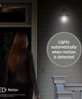 Side view of Outdoor Motion Sensor Flood Light Bulb 90W Replacement Warm White illuminating porch with motion detected