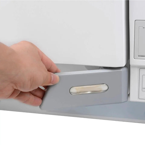 Hand opening the drawer of a 23 Liter Class B Steam Autoclave With Built In Printer Hella Large Vacuum Washer Disinfector.
