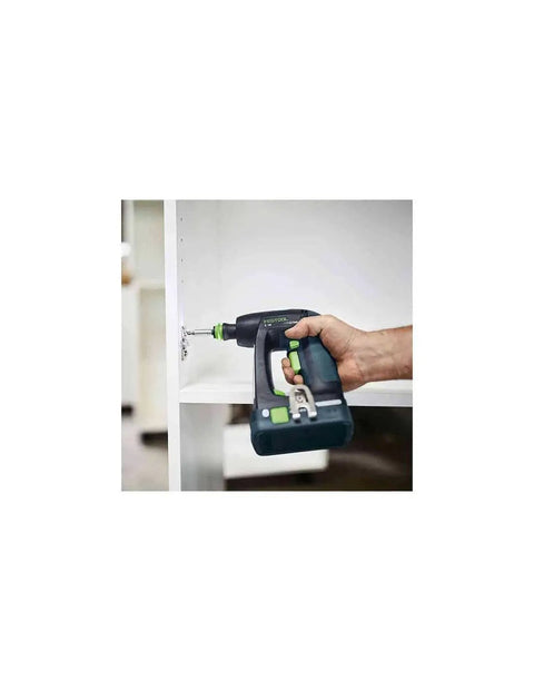 Hand using Kickass Cordless Drill Driver Combo Kit With Solid Battery And Charger for furniture assembly.