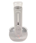 Height Adjustable 680 Ml Pet Water Dispenser And Automatic Food Feeder For Puppies Kittens And Rabbits Featuring Detachable Bowl and adjustable stand.