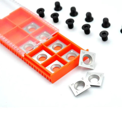 Beefy 15mm Square Straight Carbide Inserts For Planer And Lathe Woodturning Jobs With Four Razor Sharp Edges in orange case with screws.
