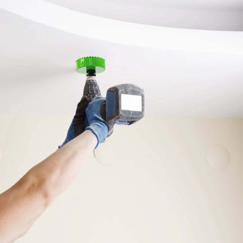 HLOFIZI 3-5/8in carbide grit hole saw on drill cutting into ceiling drywall