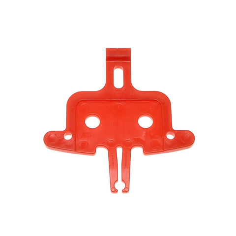 Red plastic spacer from Six Piece Bicycle Brake Pad Spacer Kit For Hydraulic Disc Brakes, Pad Spreader Insert Tool, top view.