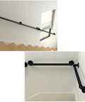 Built Rock Solid Black Wrought Iron Stair Handrail, Heavy Duty Galvanized Pipe Step Railing For Indoor Outdoor Homes, No Slip Wall Mount Grab Bar For Bathrooms And Hallways, Durable 13 Foot Support installed on a staircase wall, showing sturdy black pipe construction.