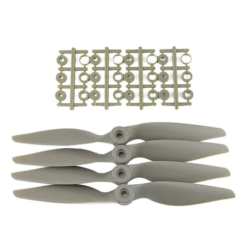 Eight Pack CCW Gemfan APC Nylon Propellers 9060 For RC Airplanes With Adapter Rings displayed in a set