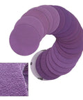 Check Out These Badass 3 Inch Sanding Discs With 320 Grit Aluminum Oxide Abrasive For Wet Dry Sanding And Waterproof Latex Backing Plus Hook System For Long Life On All Your Projects, showing multiple purple discs.