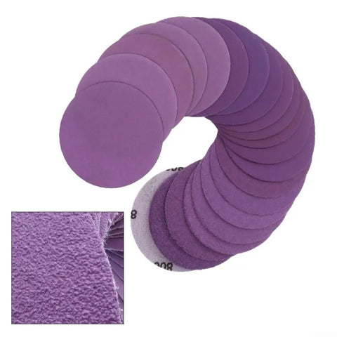 Check Out These Badass 3 Inch Sanding Discs With 320 Grit Aluminum Oxide Abrasive For Wet Dry Sanding And Waterproof Latex Backing Plus Hook System For Long Life On All Your Projects, showing multiple purple discs.