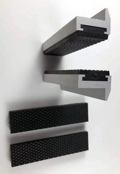 Magnetized Aluminum Alloy Rubber Soft Vise Jaws For Any Metal Vise 4 Inch With Strong Embedded Magnets And V Shape Ledge Built To Grip Round Or Hex Pieces Like A Pro Plus Spare Rubber Pair, shown from above.