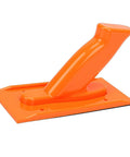 Heavy Duty Non Slip Woodworking Push Block And Safety Push Stick With Ergonomic Tilted Handle Is A Total Kickback Buster in bright orange.