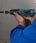 No Fuss Cordless Electric Drill And Screwdriver With 1.5Ah Lithium Battery Led Work Light Variable Speed Trigger in use on a wood panel.