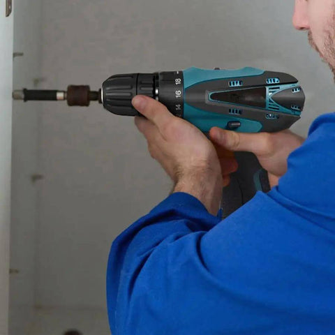 No Fuss Cordless Electric Drill And Screwdriver With 1.5Ah Lithium Battery Led Work Light Variable Speed Trigger in use on a wood panel.