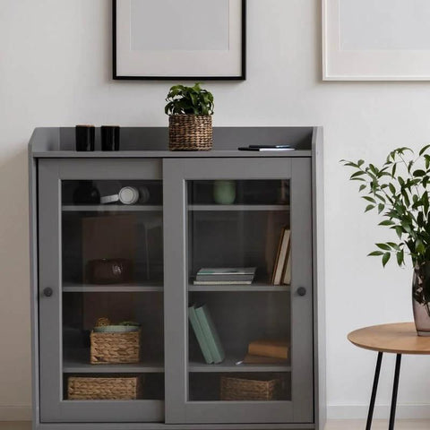 Gray cabinet with glass doors and shelves in a minimalist modern room setup.