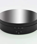 KobeIeen Electric Jewelry Turntable Display With 3 Speed Settings, sleek mirror finish turning platform with controls.
