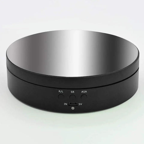 KobeIeen Electric Jewelry Turntable Display With 3 Speed Settings, sleek mirror finish turning platform with controls.