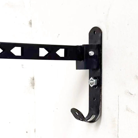 Pro Grade Threaded Concrete Nails With M8 Nut Caps Hardcore Hammer Set Fasteners mounted on a wall with a hook end.