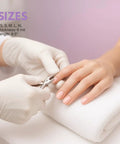 Using Top Grade 6 Mil Latex Work Gloves Powder Free With Fully Textured Palms For The Ironclad Knockout Grip during a manicure.