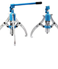 Heavy Duty Hydraulic Gear Puller Packing A Rugged Three Jaw Grip And Leak Proof Steel Frame For Yanking Stubborn Bearings Hubs And Gears Up To Twenty Tons Without Breaking A Sweat In Your Daily Shop Projects showing a close-up view of metallic design with blue parts.
