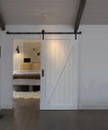 White sliding barn door installed with 10 Pack Self Stick Push Pull Helper Abs Plastic Handles For Doors Cabinets Drawers Wardrobes Instant Adhesive Mount Black.