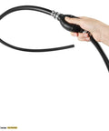 Hand holding Three Eighth Inch Nylon Braided Marine Fuel Line Assembly With Primer Bulb And Stainless Clamps Six Foot Universal Fuel Line Kit