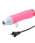 Mini 300W Heat Gun With Stand For DIY Embossing Shrink Tubing And Drying Paints Multi Purpose Hot Air Tool Lightweight Electric Heating Gun 110V Pink And White, shown with power cord