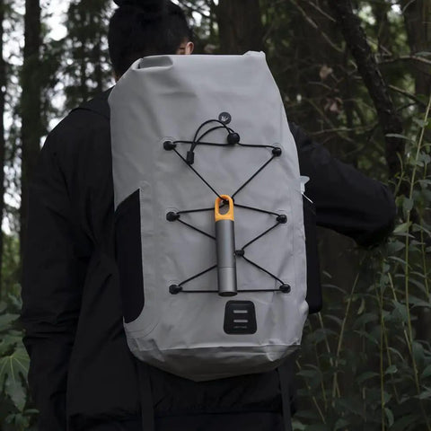 Backpack with Zoomable USB C Rechargeable Flashlight 1000 Lumens LED With Five Modes Including SOS And Strobe in forest