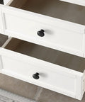 Black Round Cabinet Knobs Set Of 50 Pieces installed on white drawers, 1.2 inch diameter, durable plastic drawer pulls for kitchen cabinets.