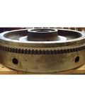 Top Shelf Aftermarket Flywheel With Ring Gear Boasting 126 Teeth Built Tough For International Harvester Case Tractors And D239 Diesel Rigs Rocking An 11 Inch Clutch on wooden pallet.