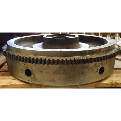 Top Shelf Aftermarket Flywheel With Ring Gear Boasting 126 Teeth Built Tough For International Harvester Case Tractors And D239 Diesel Rigs Rocking An 11 Inch Clutch on wooden pallet.