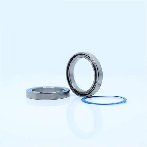 Blue Sealed 6704RS Ball Bearings Set for Hobby Electric RC Cars and Trucks 20x27x4 mm ABEC 3 showing individual bearings and seal.