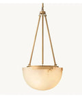 Top Tier Black And Gold Marble Pendant Light Fixture For Upscale Kitchens And Banquet Halls With A Sleek Modern Ceiling Hanging Chandelier that features a round glass shade and gold metal supports.