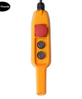 Heavy Duty 1100 Lbs Electric Chain Hoist Handling Heavy Loads Without Breaking A Sweat, Featuring Lightning Fast 13 Ft Lift Speed And A Rock Solid 1300W Motor, Straight Up Reliable For Garage Cranes Shops And Weekend Warriors control pendant with buttons for lifting and lowering.