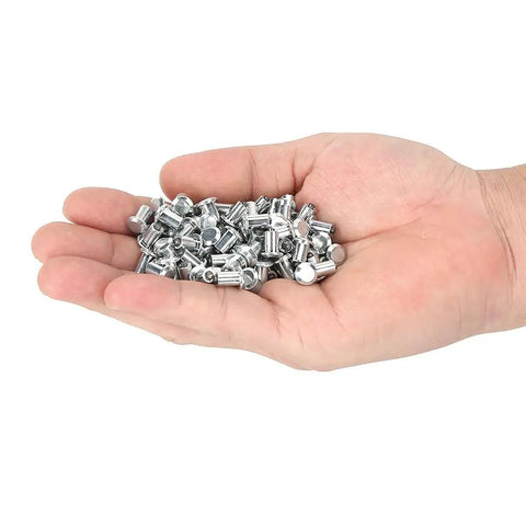 Heavy Duty Tire Stud Screws And Tungsten Steel Anti Slip Nails For Cars Motorcycles ATVs and UTVs in a hand, pack of 100 nails.
