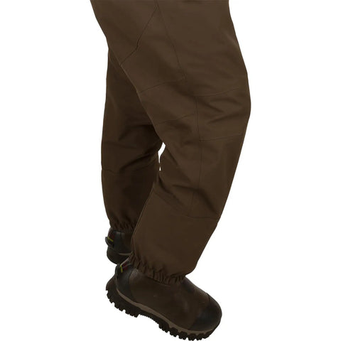 Back angle of Men's Insulated Guardian Elite Front Zip Wader With TiZIP MasterSeal 10 Vertical Zip showcasing reinforced boot area