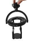 Self Leveling Cup Holder With Gyroscopic Anti Spill Guard, 60 Degree Rotating Clamp securely holding a drink in black.