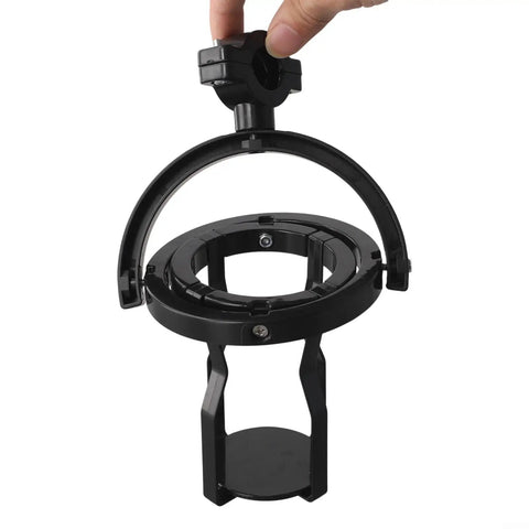 Self Leveling Cup Holder With Gyroscopic Anti Spill Guard, 60 Degree Rotating Clamp securely holding a drink in black.