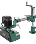 Premium Knockout Four Roller Woodworking Power Feeder With Four Speed Settings And One Full Horsepower Motor, showcasing motor and rollers.