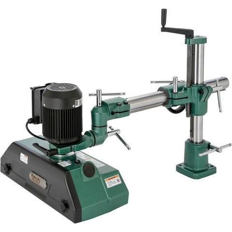 Premium Knockout Four Roller Woodworking Power Feeder With Four Speed Settings And One Full Horsepower Motor, showcasing motor and rollers.