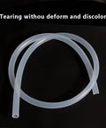 Three Eighths Inch ID And One Half Inch OD Top Notch Food Grade Silicone Tubing coiled on black background
