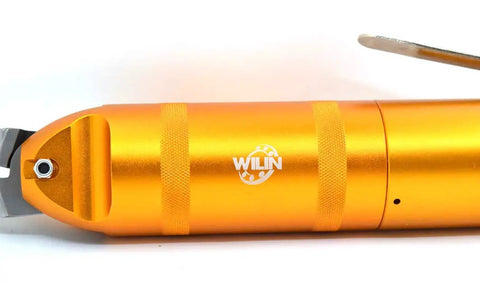Close-up of Beastly Pneumatic Wire Cutter Nipper For Heavy Duty Metal Wire Mesh And Cable Cuts, featuring orange body and blade.