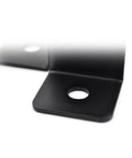 Close-up of metal adjustable half column post base brackets with holes for bolts, part of a Four Pack Adjustable Half Column Post Base Brackets For 1.5x1.5, 2x2, 2x4, and 4x4 Wood Posts.