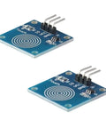 Two TTP223B digital proximity switches for Arduino projects, blue square modules with touch sensor patterns and pin headers.