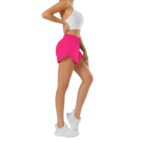 Side view of a model wearing hot pink womens running shorts with quick dry fabric featherweight stretch built in brief liner elastic no slip waistband