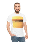 Man wearing Outrigger Canoe Sunset Molokai Hawaii Tee Unisex Heavy Cotton Shirt White Size Large With Relaxed Fit, front view.