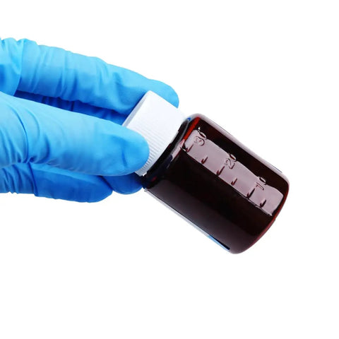 WS2 Tungsten Disulfide Powder For Lubrication, 1.9 Micron Particle, Purity Over 99.9%, in a small brown bottle held by a gloved hand